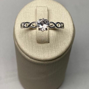 ANEL SOLITÁRIO INFINITO CORAÇÃO C/ ZIRC. 5MM CRISTAL