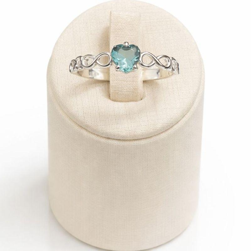 ANEL SOLITÁRIO INFINITO CORAÇÃO C/ ZIRC. 5MM AGUA MARINHA