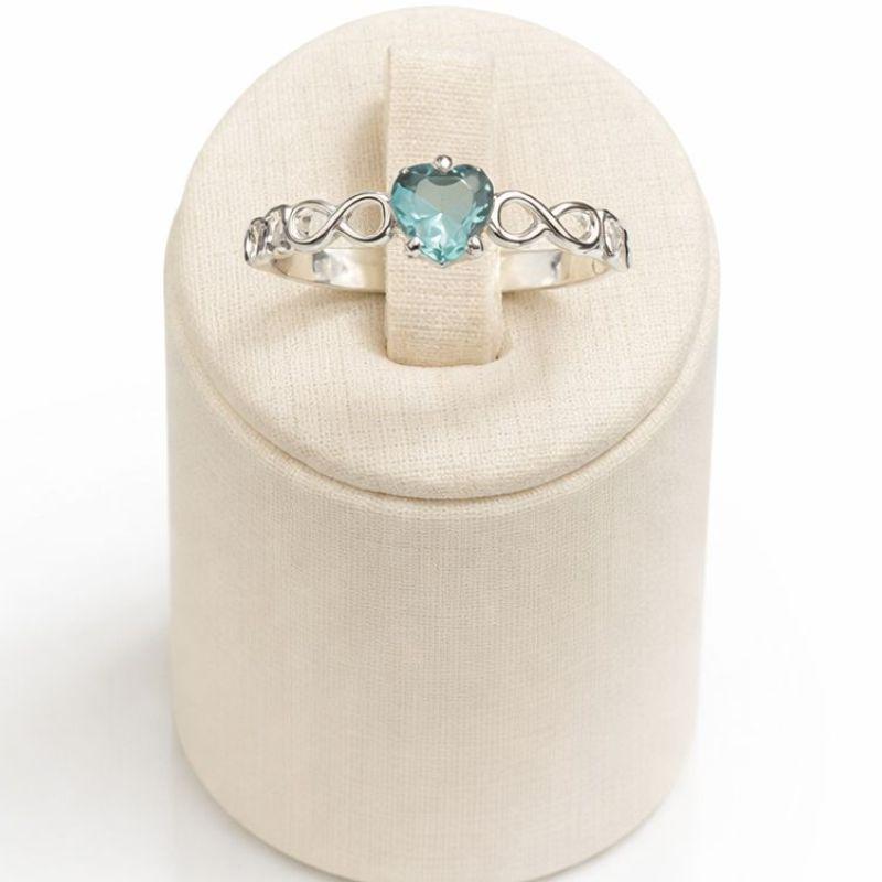 ANEL SOLITÁRIO INFINITO CORAÇÃO C/ ZIRC. 5MM AGUA MARINHA