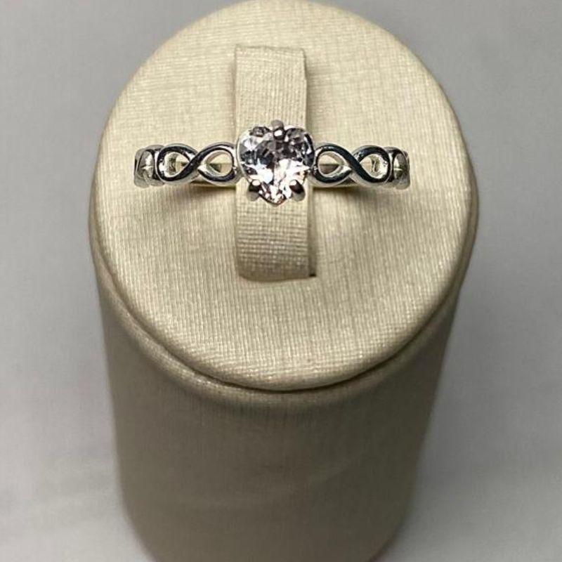 ANEL SOLITÁRIO INFINITO CORAÇÃO C/ ZIRC. 5MM CRISTAL